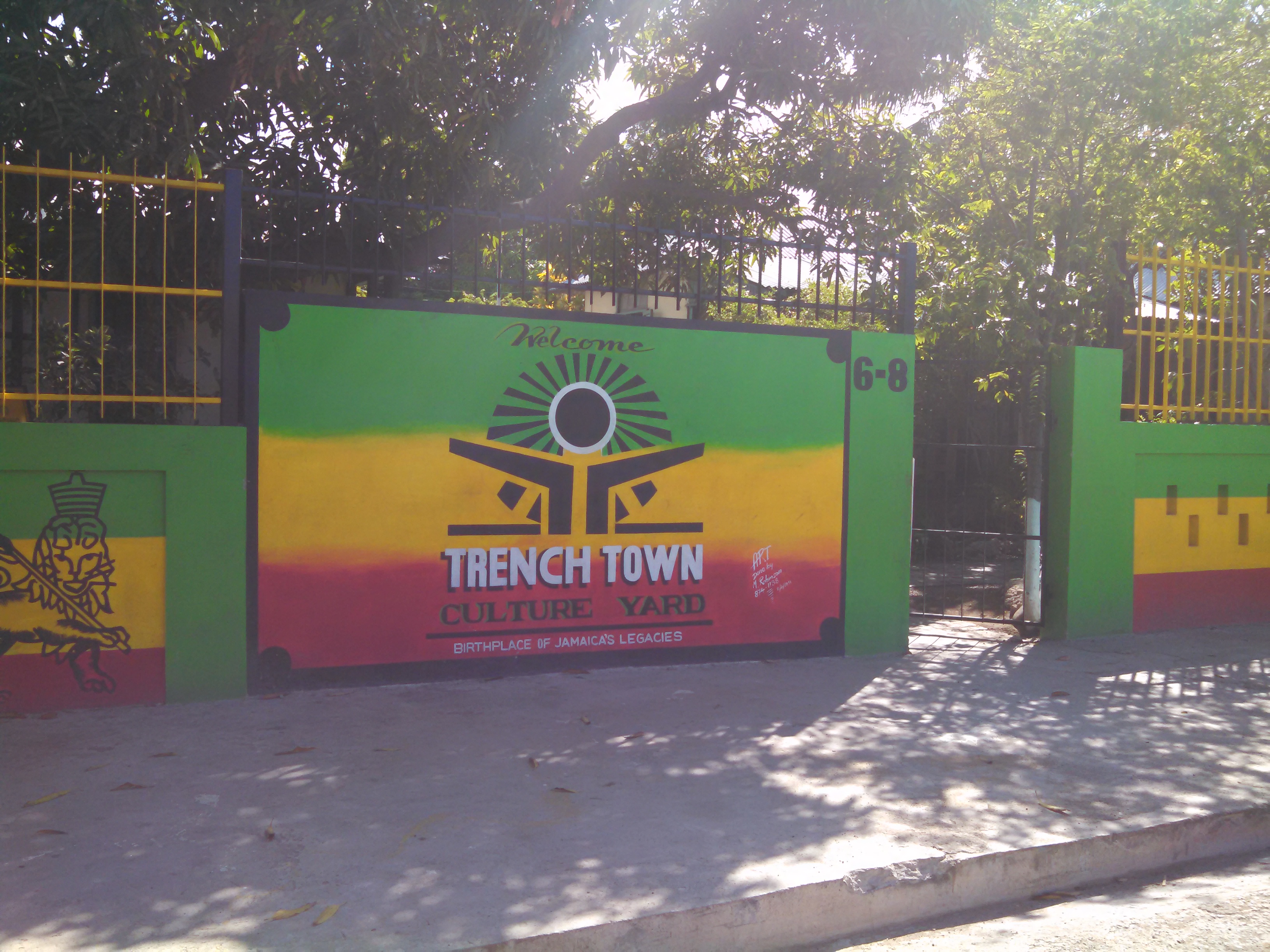 A gate into the Trenchtown housing project