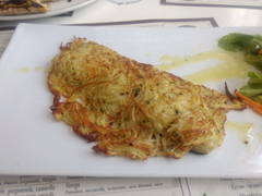 sea bass hiding under a potato crust