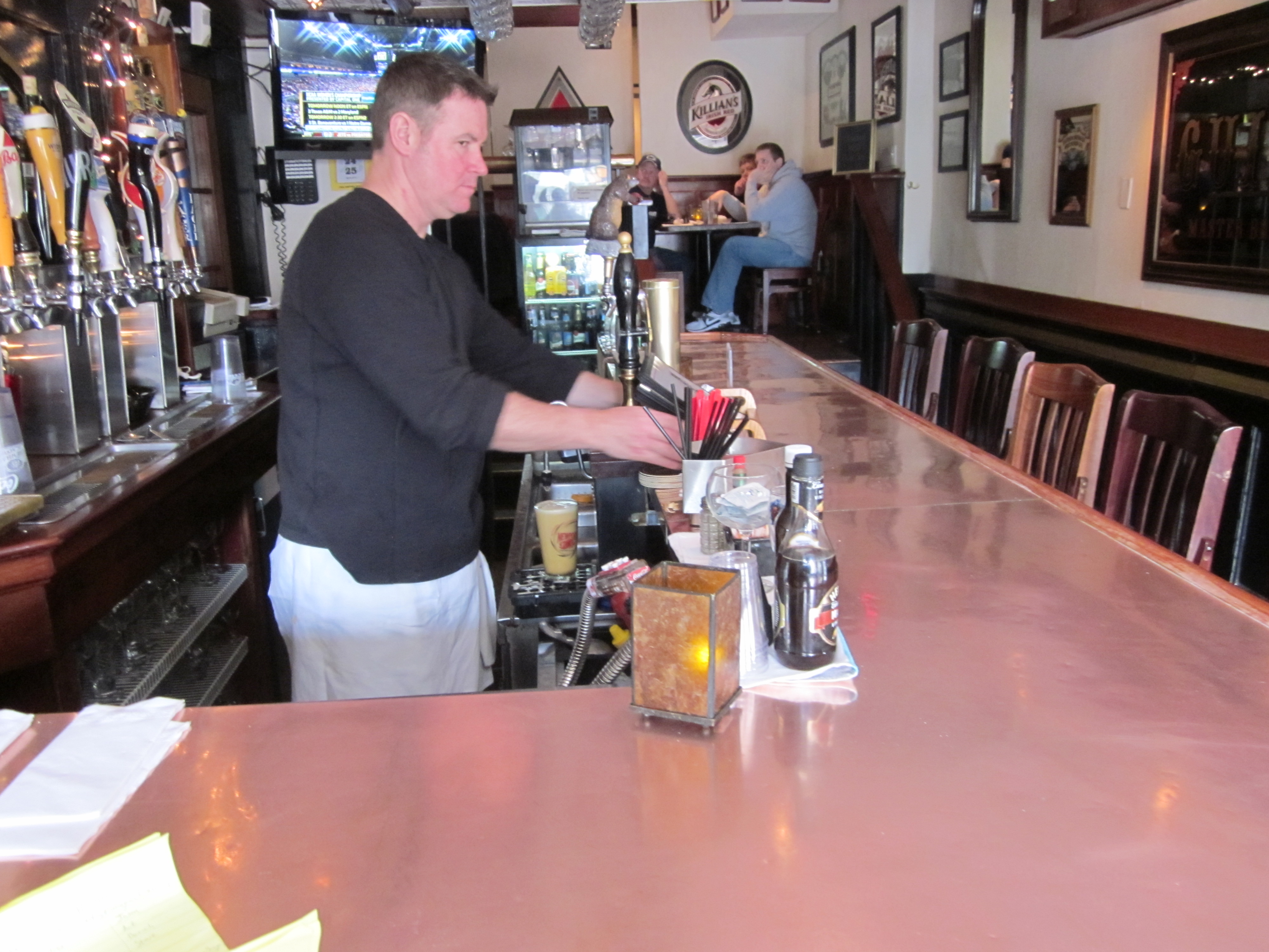 the Wharf Pub's copper bar